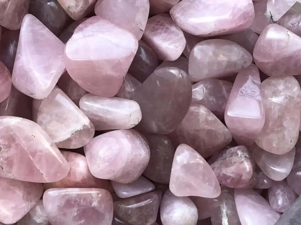 Rose quartz tumbles close up 